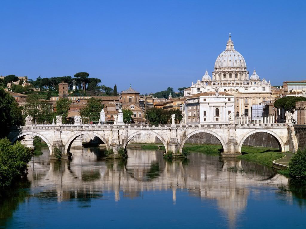 TheVaticanSeenPasttheTiberRiverRome.jpg