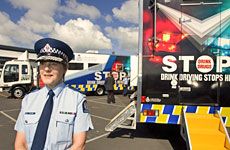 Supt Paula Rose, with Booze Buses in the background, thanks to Paul Estcourt for the pic - click to read the New Zealand Herald story