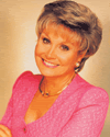 click to read Angela Rippon's biography - thanks tp Z Design & Print for the pic.