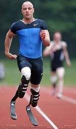 Oscar pistorius sprinting to victory in the 100 metres