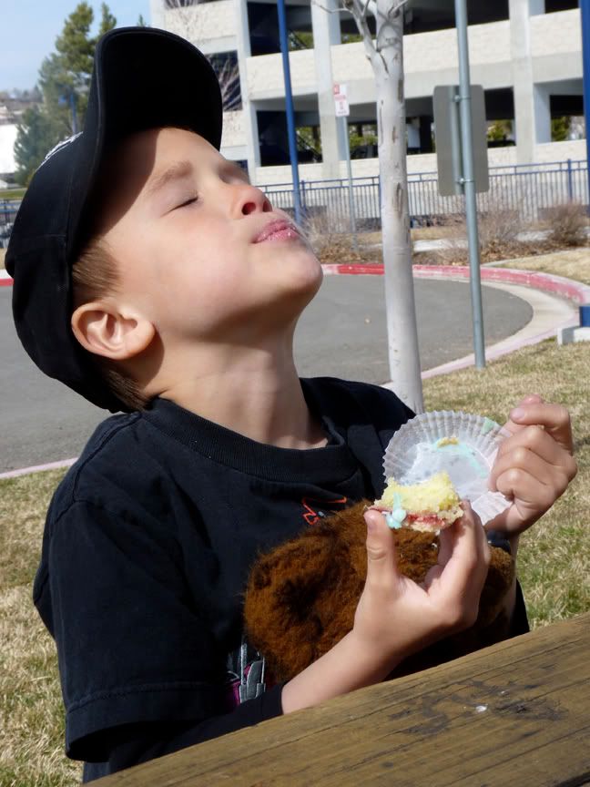 Jakob and Chocolate Bear enjoy a petit fours