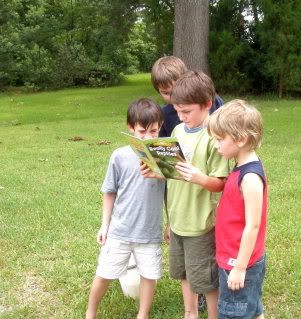I guess for boys this age, finding a book of reptiles really is THIS interesting, lol